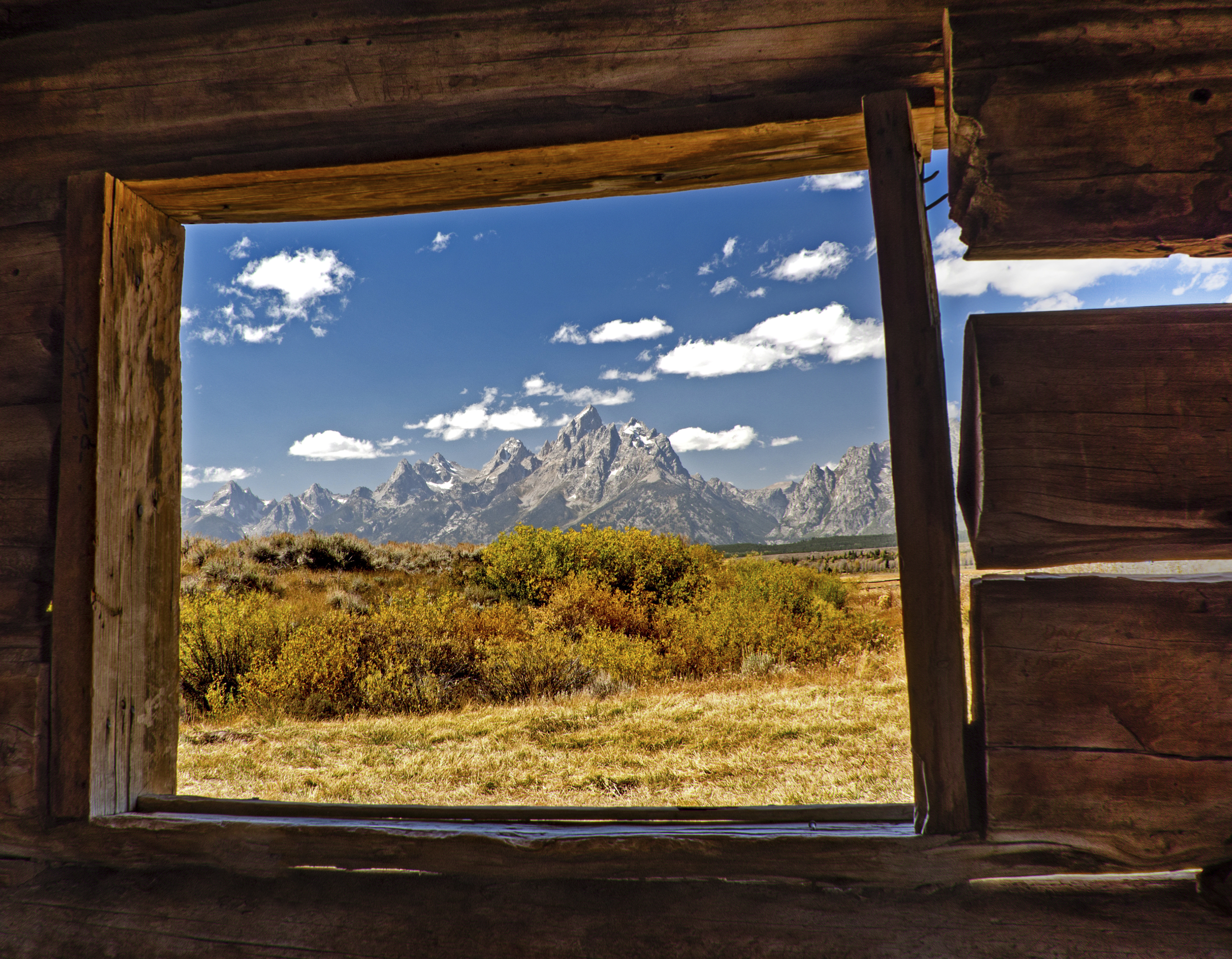 Cabin view of Grand Tetons