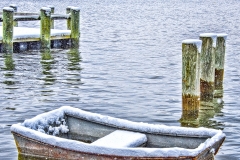 Row boat in snow Northport Harbor