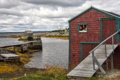 red fishing shack and fish house