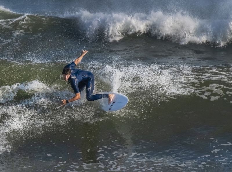 Surfer-sideways-on-wave