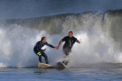 2-surfers-almost-colide