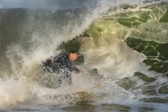 Surfer-in-a-closing-curl